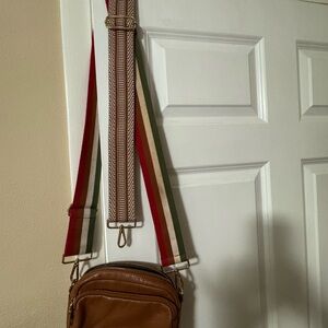 Pom Pom leather bag with multiple straps